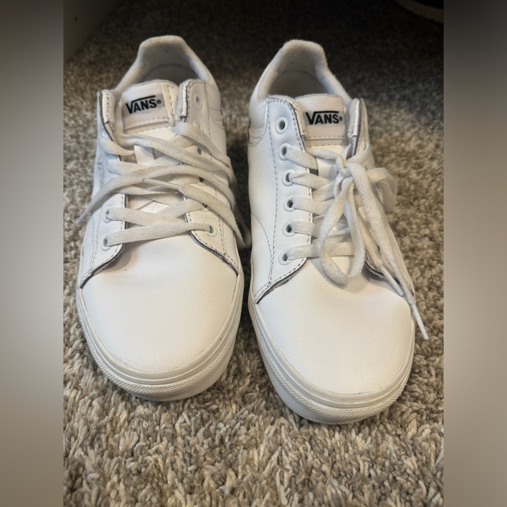 Women’s vans- size 8. They have been worn a few times. Very clean white.